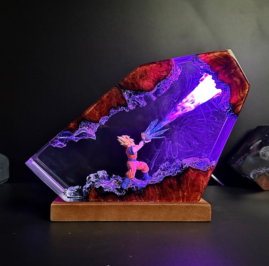 Illuminated Goku lamp featuring Kamehameha attack with purple Light. Dragon Ball Z resin sculpture with glowing energy beam. Unique side-view design of Spirit Bomb-like effect in Dragon lamp form.