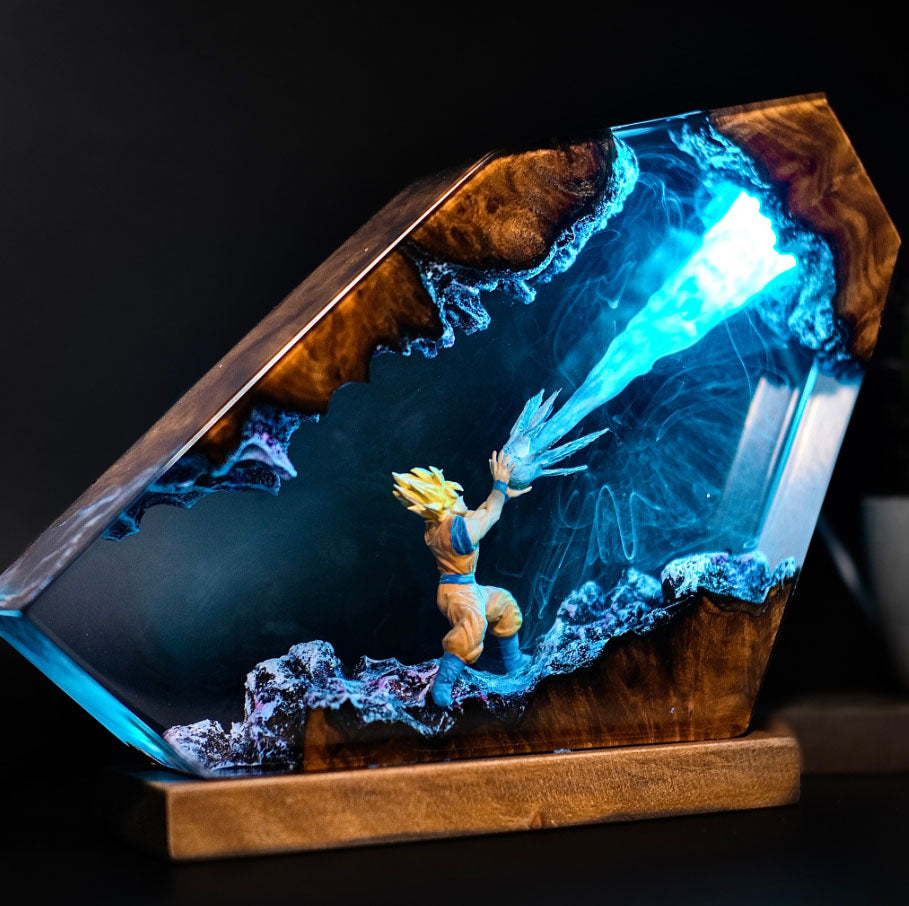 Illuminated Goku lamp featuring Kamehameha attack with Blue Light. Dragon Ball Z resin sculpture with glowing energy beam. Unique side-view design of Spirit Bomb-like effect in Dragon lamp form.