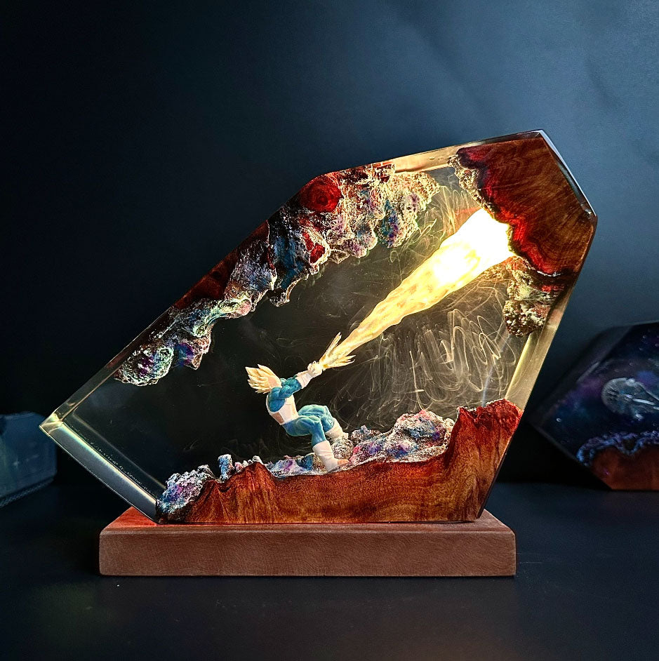 Anime-inspired resin art: Dragon Ball Z Kamehameha lamp, glowing energy blast from blue warrior, crystal-encased scene, vibrant purples and reds, unique VegetaLamp on wood stand