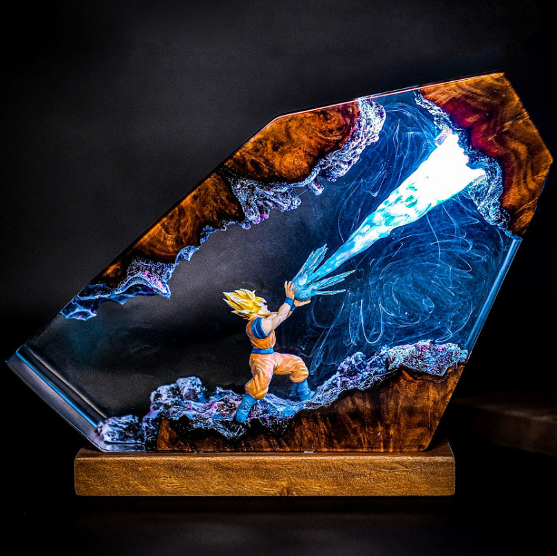 Illuminated Goku lamp featuring Kamehameha attack with Blue Light. Dragon Ball Z resin sculpture with glowing energy beam. Unique side-view design of Spirit Bomb-like effect in Dragon lamp form.