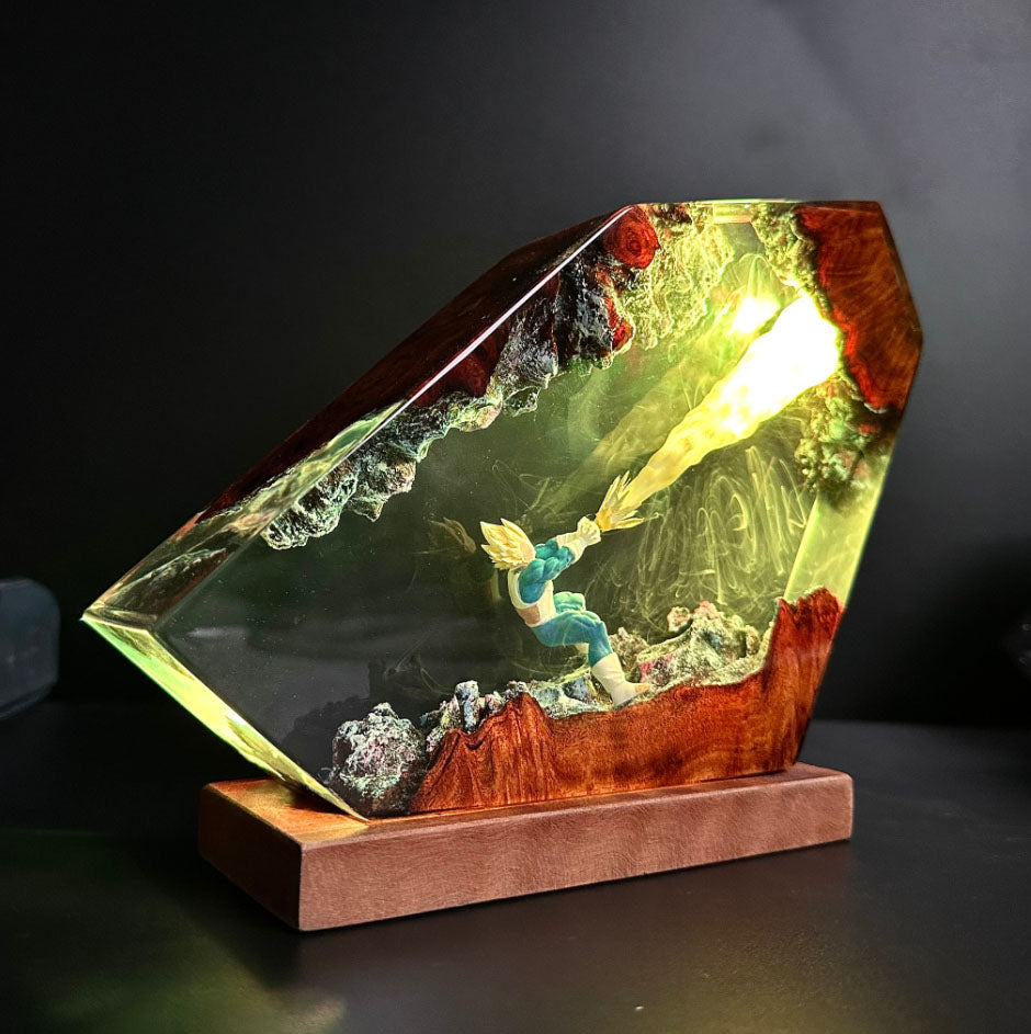 Illuminated Dragon Ball Z art: VegetaLamp featuring Kamehameha attack, resin sculpture with glowing energy beam, blue fighter in crystalline environment, unique anime-inspired dragon lamp